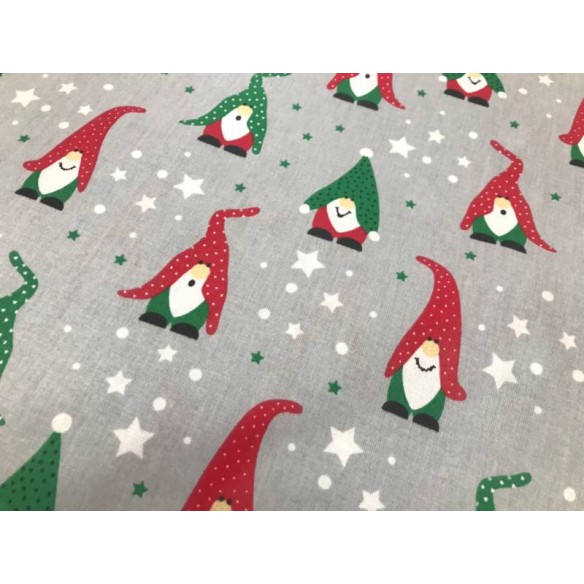 Бавовняна тканина - різдвяні зірочки та червоно-зелені капелюшки Санта Клауса